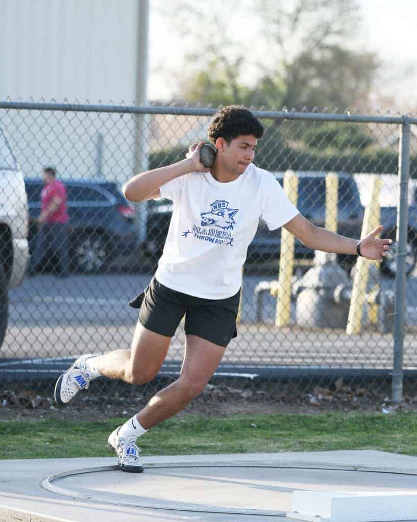 Photo - Madera’s Bryson Smith throws the shot put during one of the few meets he got to participate in before the COVID-19 pandemic hit in March. Smith signed a National Letter of Intent to San Jose State University last month.