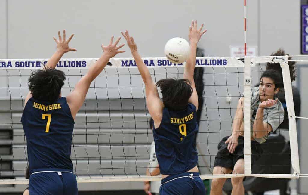 Photo - Madera South’s Mario Aguirre rises up for a kill during last Tuesday’s match with Sunnyside. The Stallions lost the match in three sets by a total of 11 points. However, on Thursday, led by Aguirre’s 13 kills, Madera South defeated Sanger West in three sets.