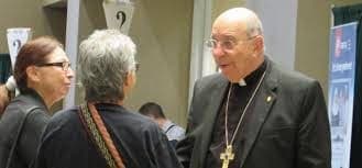 Photo - Retiring Bishop Armando Ochoa is shown here on the right.