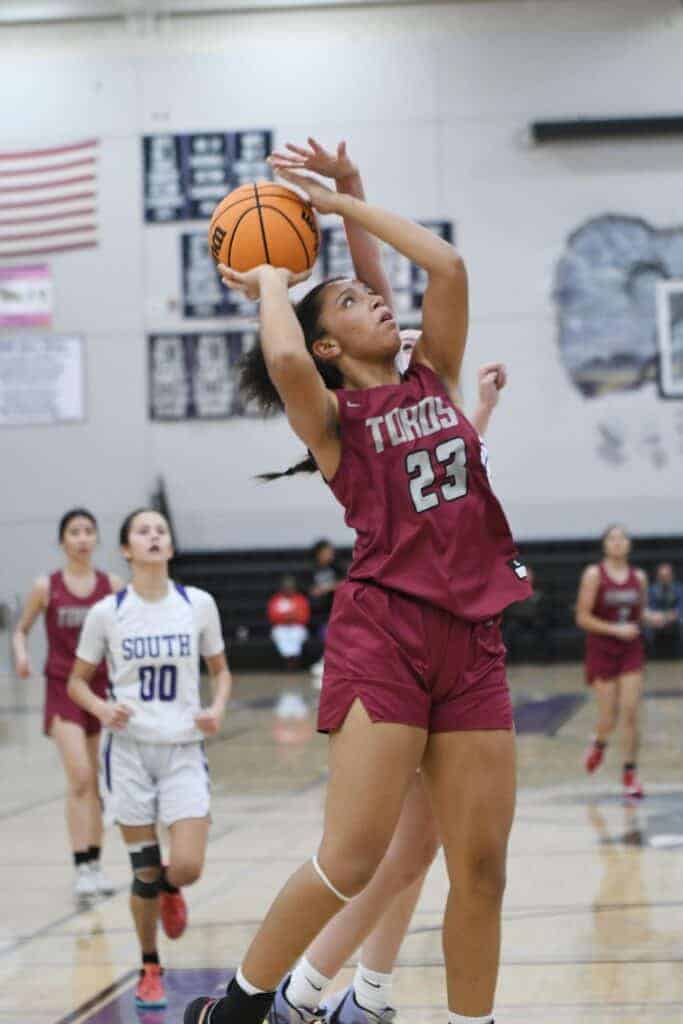 Photo - Matilda Torres’ J’Lynn Mitchell drives the lane to score two of her six points in Monday’s win. She pulled down a game-high 10 rebounds.
