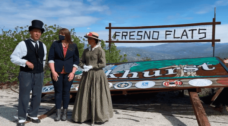 Photo - The Sierra Historic Sites Association takes advantage of the downed “Welcome to Oakhurst” sign to put up its own Fresno Flats sign on April Fool’s Day. The association used the prank to call attention to the plight of nonprofits who have struggled during the pandemic.