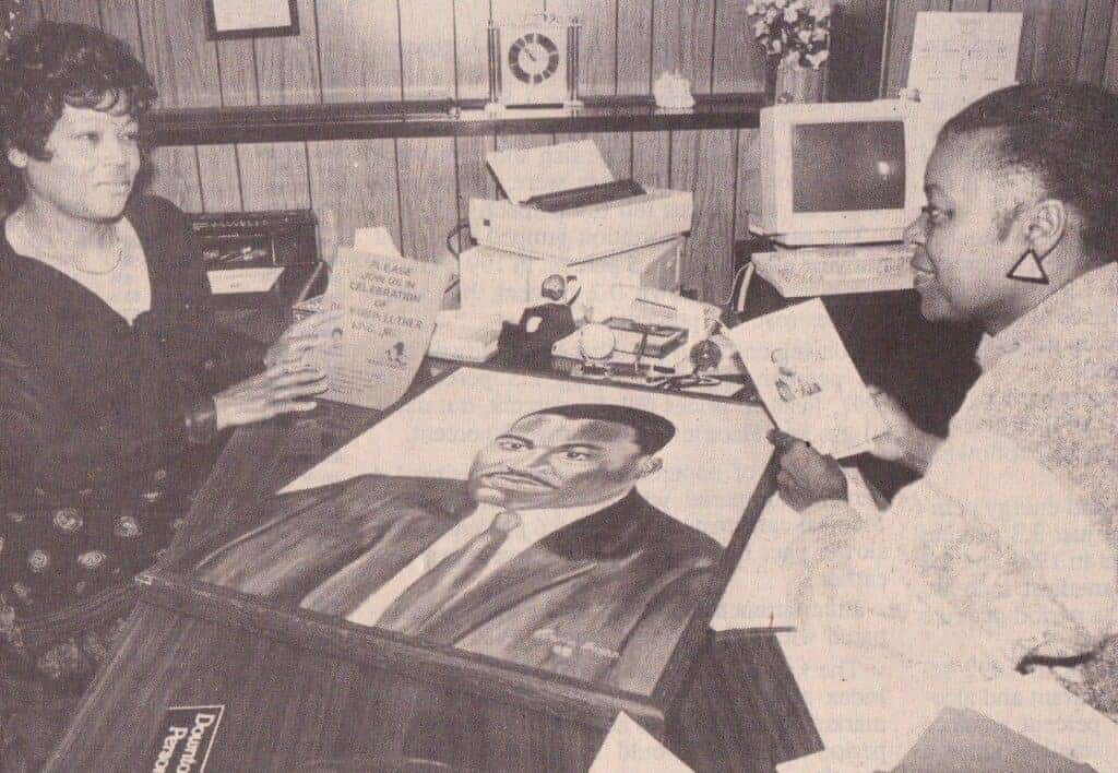 Photo - Twenty-five years ago, Dorothy Williams, left, coordinator, and Barbara Roach, mistress of ceremonies, for the Martin Luther King Jr. celebration, prepared for the festivities, which took place Sunday, Jan. 17. The theme of the program was “Looking Back, Moving Forward.”