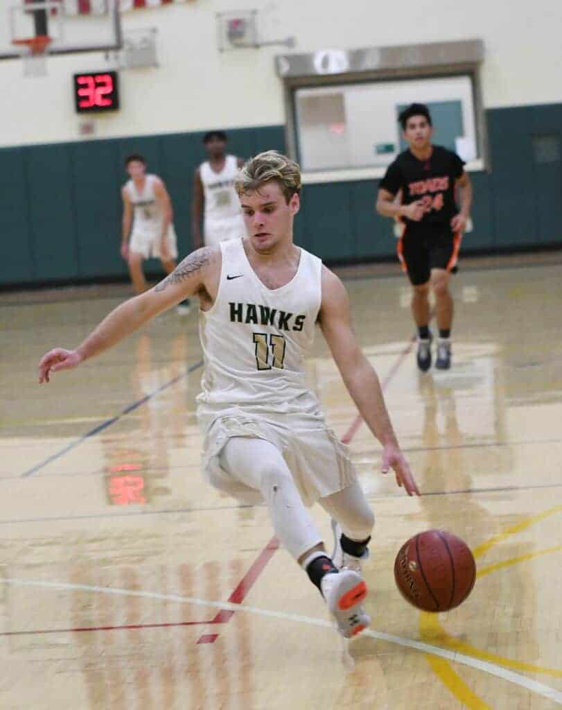 Photo - Liberty guard Logan Stephens helped lead the Hawks to a first-round playoff victory in the Div. V Central Section playoffs and also earned a First Team All-North Sequoia League selection.