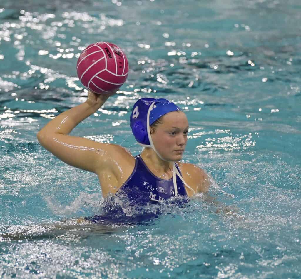 Photo - Madera’s Emily Wattenbarger reaches back to fire a shot for one of her team-high four goals in Thursday’s quarterfinal playoff loss to Frontier.