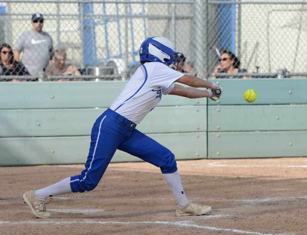 Photo - Madera’s Mariah McMillon reaches for a drag bunt single during Tuesday’s loss to Bullard. McMillon had two hits in the game.