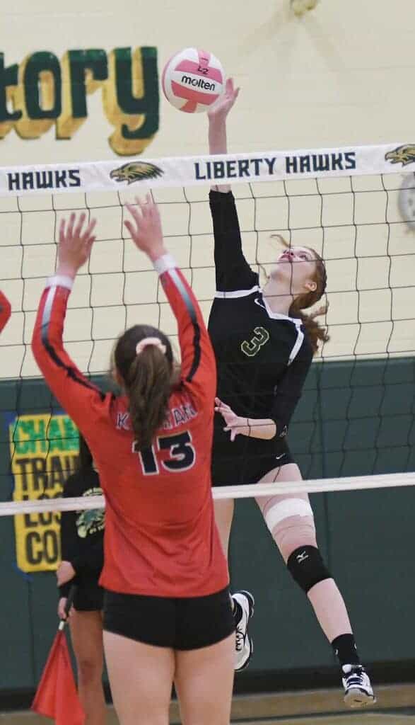 Photo - Liberty’s Lucia Somilleda goes up for one of her nine kills in a four-set victory over Kerman on Tuesday.