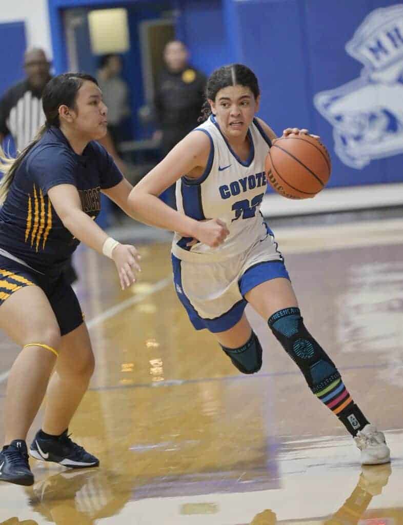 Photo - Madera’s Brooke Houghton tries to the corner to drive the lane during Thursday’s loss to Sunnyside in Joe Flores Gym.
