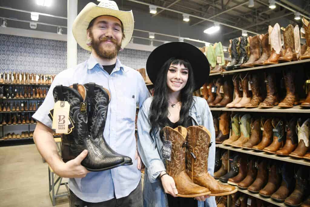 Photo - J Perriguey and Violet Konkle are employees at the new Boot Barn at 2220 W. Cleveland Ave. They are hosting a grand opening April 1st-3rd and a ribbon cutting ceremony April 1 at noon.