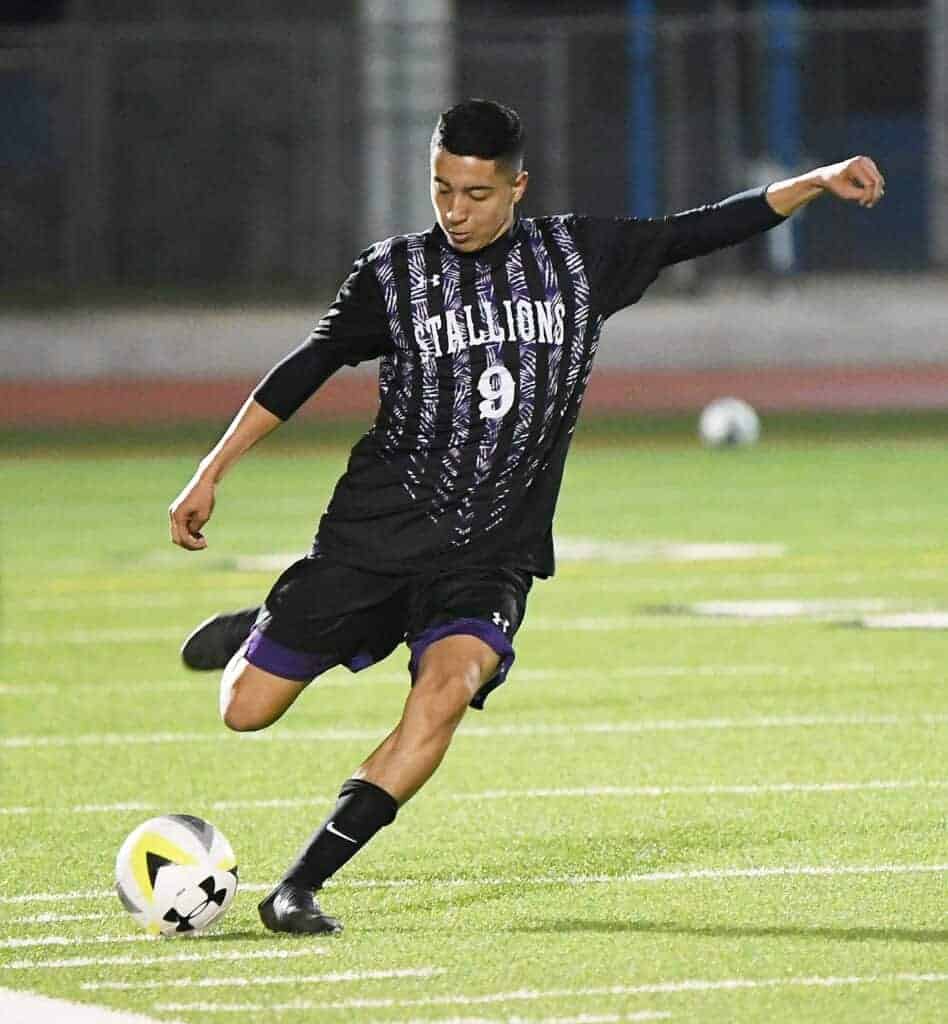 Photo - Madera South’s Daniel Maciel gets a kick off during Tuesday’s CIF State playoff game. Maciel scored the insurance goal in a 2-0 victory over Ceres.