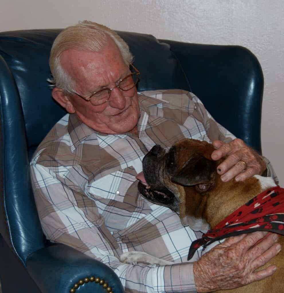 Photo - The Rev. Dr. James E. Fox and his boxer, Tyson.