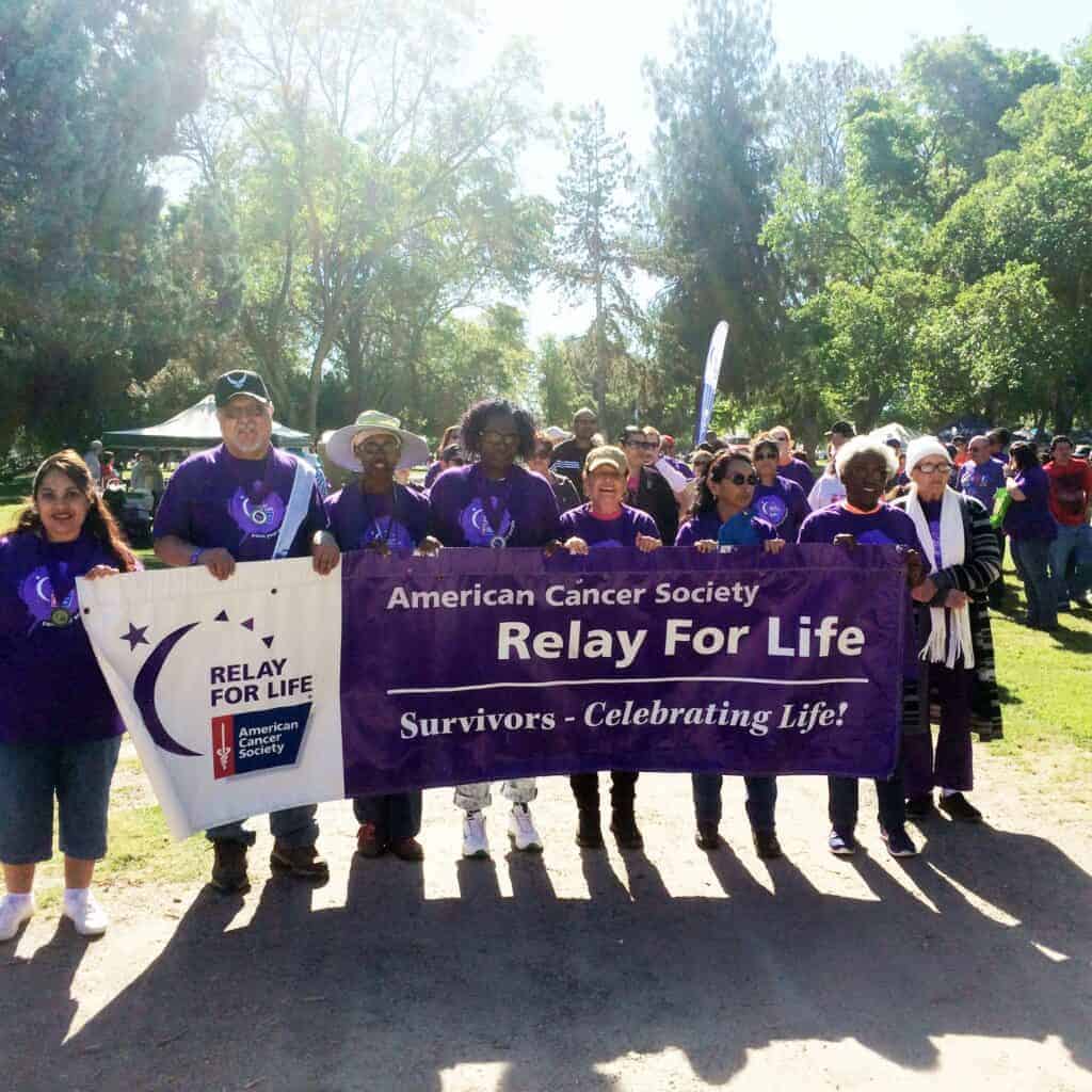 Photo - With the traditional and honorary initial lap, cancer survivors parade around the track after ceremonies that opened this year’s Relay For Life held in 2017 at Lions Town and Country Park. This year’s event is set for Saturday.