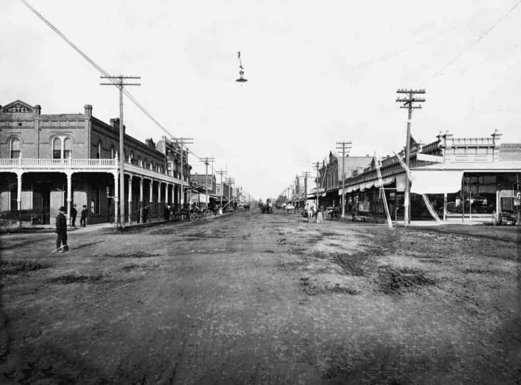 Photo - One hundred years ago, the city fathers cast jaundiced eyes toward the balcony of the Yosemite Hotel, shown here in the lower left of the photo. Although the balcony appeared safe enough, looks were deceiving. It was on the verge of collapsing, so the City Council ordered it torn down.