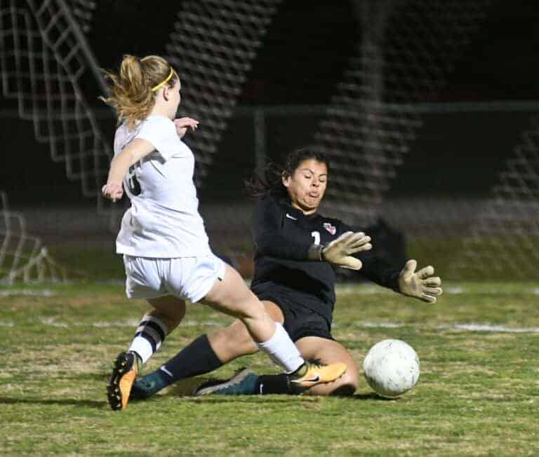 Hawks come back for Div. II victory