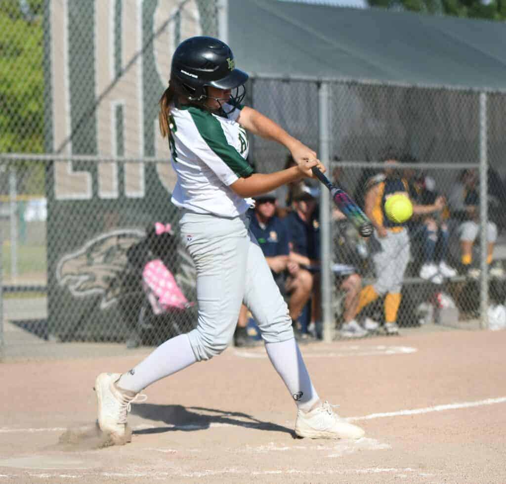 Photo - Liberty’s Lauren Chapman swings at a pitch during Tuesday’s victory over the Sunnyside Wildcats. She had two hits and drove in three runs while scoring two runs.