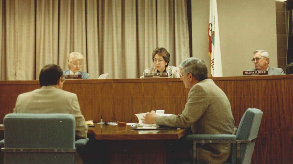 Photo - Councilwoman Marge Medellin talks during a city council meeting.