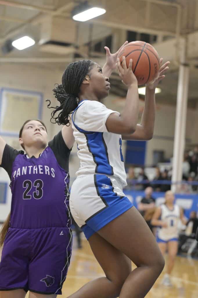 Photo - Madera’s Aaliyah String goes up for two of her team-high 18 points in Tuesday’s loss to Pacheco.