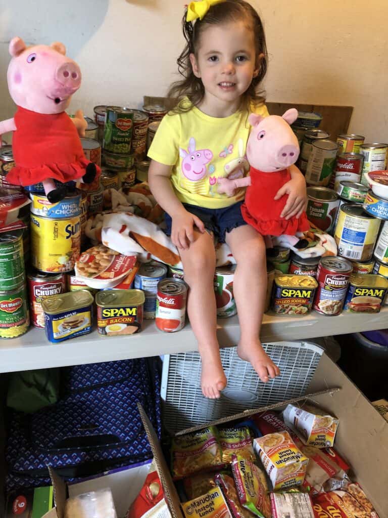 Photo - Leia Garcia celebrated her 3rd birthday on May 3rd with a Peppa Pig Parade and Food Drive and collected 486 cans of food to donate to the Madera Rescue Mission.
