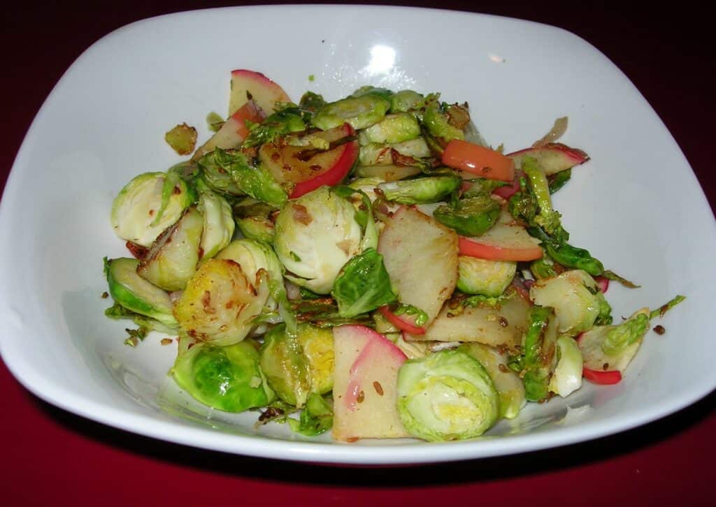 Photo - Try making a salad from Brussels sprouts, onion, apple, slivered almonds and a vinaigrette dressing.
