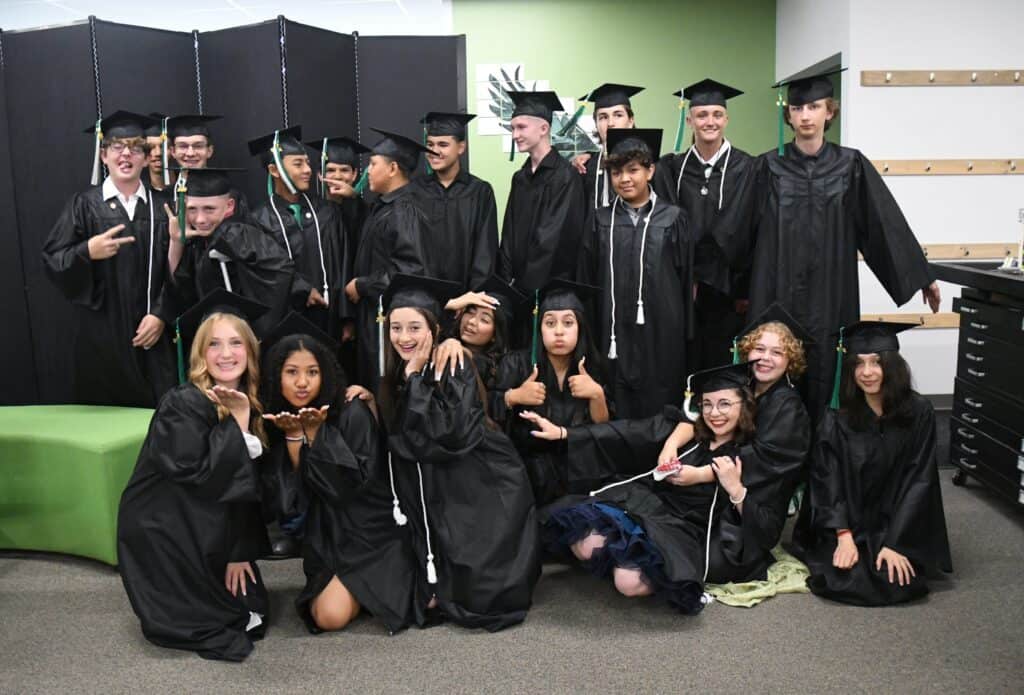 Photo - Sherman Thomas STEM Academy students take a fun photo before their promotion ceremony on June 6