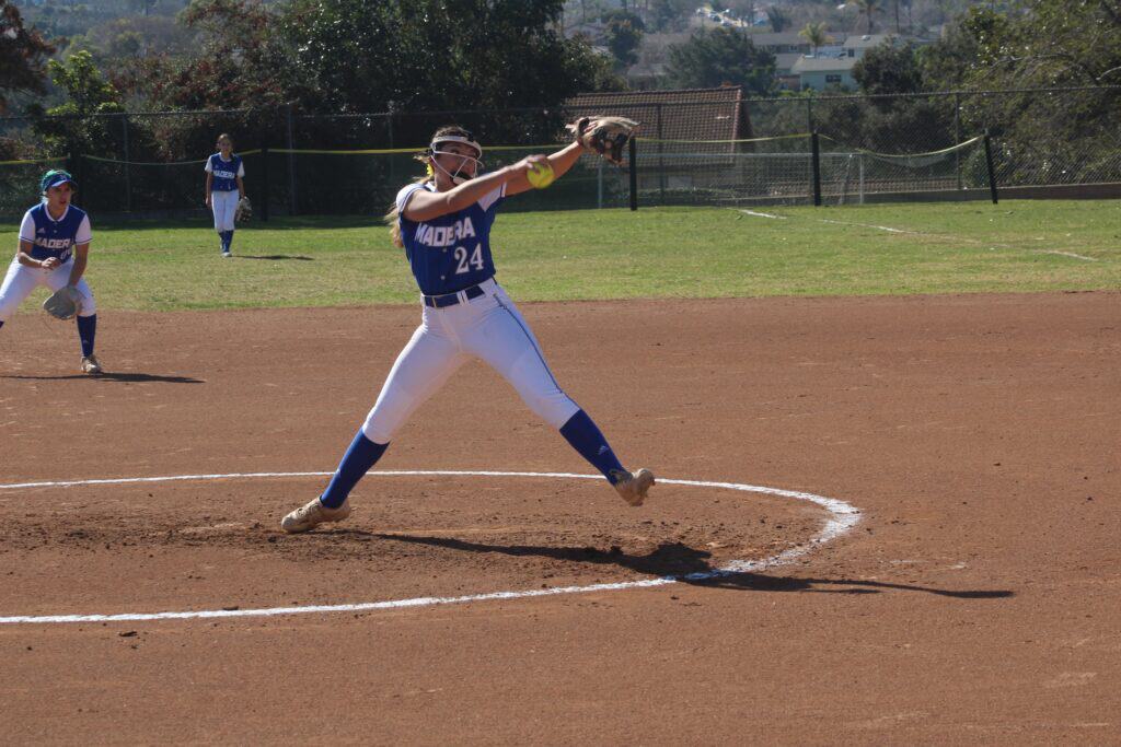 Photo - Madera’s Alexis Galvan throws a pitch during a 6-1 loss to St. Joseph’s on Saturday. She struck out a career-high 15 batters later in the day against Atascadero.