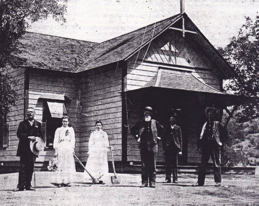 Photo - This group of O’Neals citizens posed for this photograph in front of the Spring Valley School in 1895. The school was just a short distance from where vigilantes hanged Victor Adams in the same year.