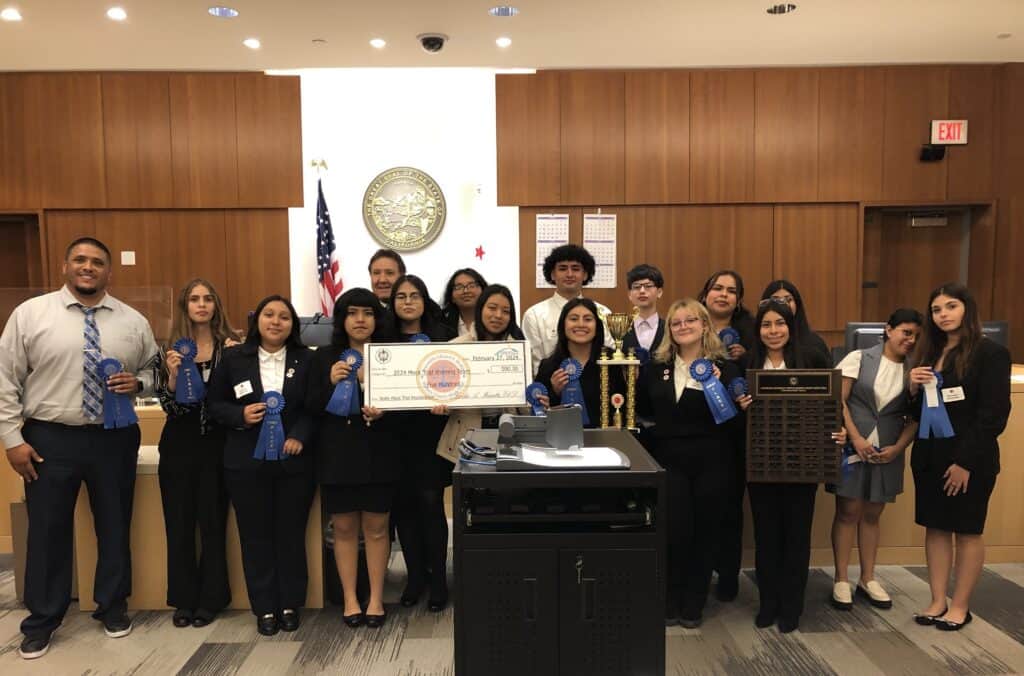 Photo - Madera South High School winning Mock Trial team with Judge Ernest LiCalsi.