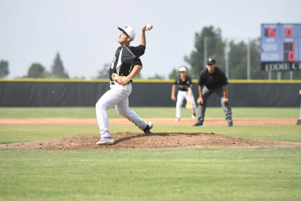 Photo - Madera South senior Chris Jones throws a pitch during the regular season finale Tuesday at Eddie Chapa Field against the San Joaquin Memorial-Panthers.