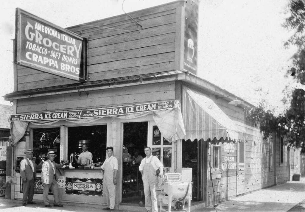 Photo - Frank Crappa is shown here standing on the far right. His brother, Joe Crappa, is on the inside behind the counter.