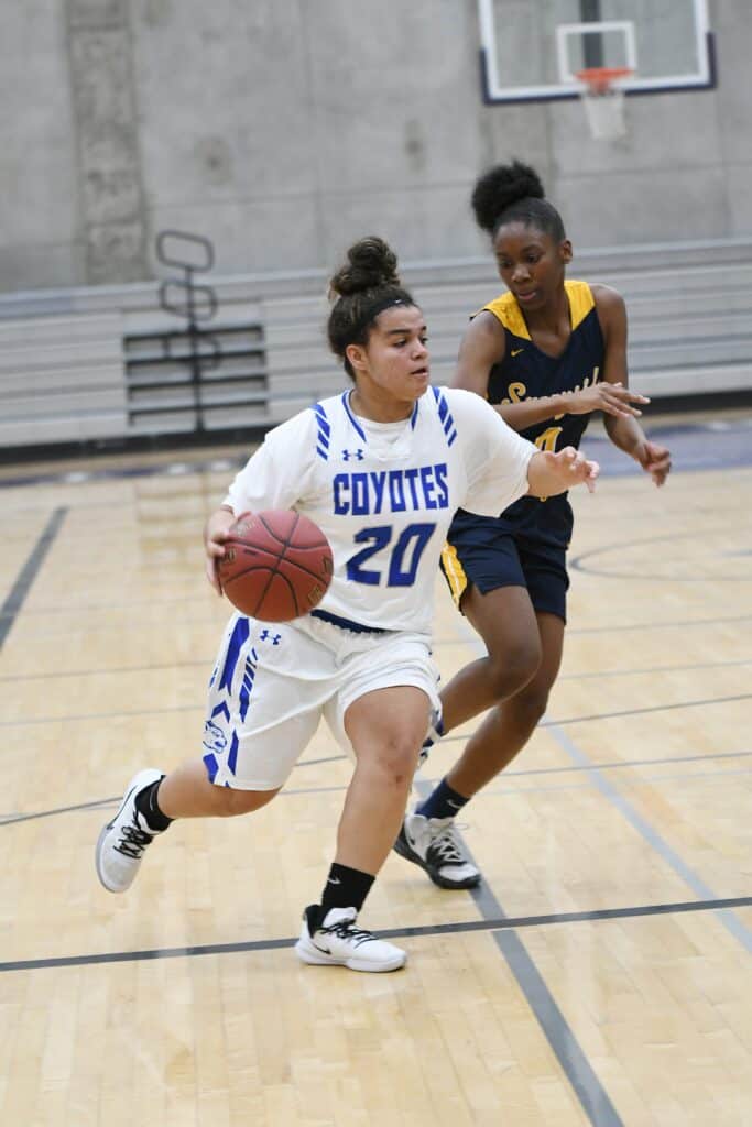Photo - Madera’s Stephenie Jordan drives past a Sunnyside player during Wednesday’s victory. Jordan scored eight points to go with eight rebounds in the win.