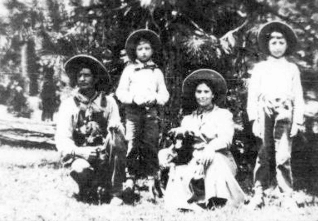 Photo - Olive Hensley is shown here with her sons Leonard and Earl and her husband; We are just not sure which husband, Charles Hensley or Walter Hensley?