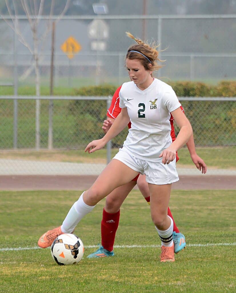 Photo - Liberty’s Haylee Hoelzel controls the ball for the Hawks in a 2-0 victory over Coast Union in 2015.
