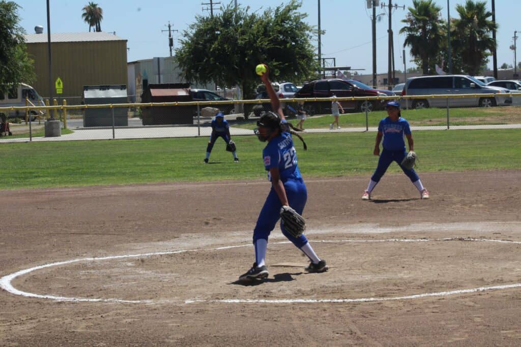 Photo - Madera National’s Isis Santoyo throws a pitch during a one-hit victory over Sequoia in the first game of Saturday’s 8-10-year-old Valley Section All-Star Tournament.