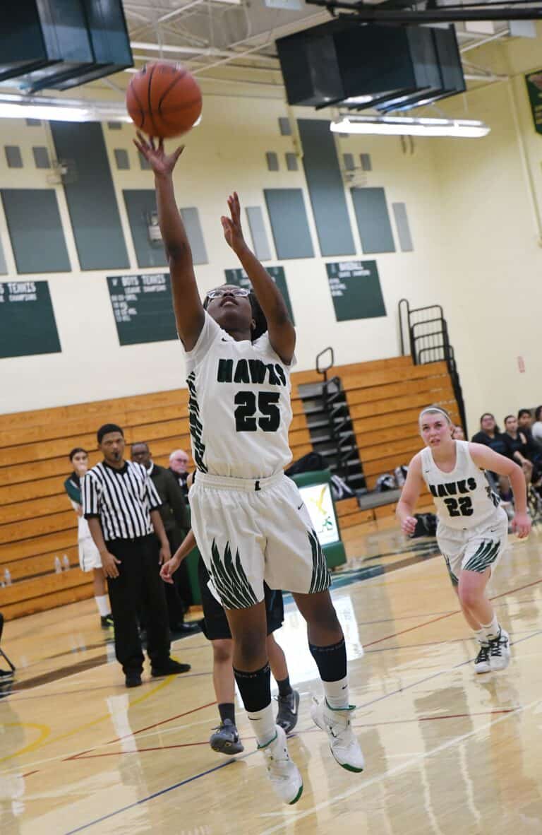 Whetsel leads Hawks to overtime win
