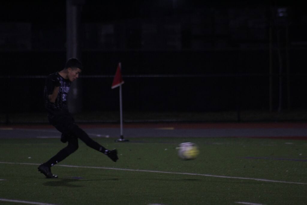 Photo - Madera South’s David Salas sends a penalty kick into the right side of the net to tie Friday’s match at one during a 4-4 tie with Bullard.