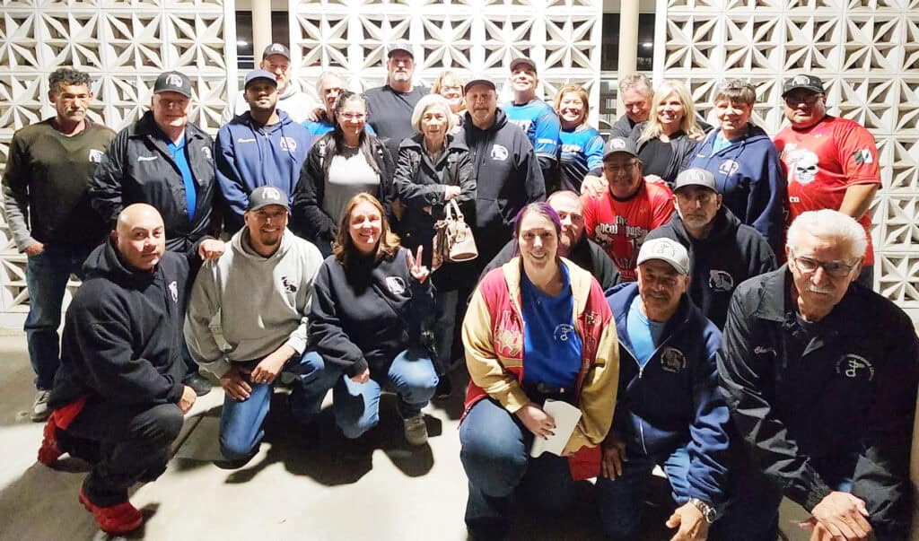 Photo of Members of the Big Valley Horseshoe League gathered for a photo at City Hall after presenting a request for more pitching courts during a City Council meeting last month.