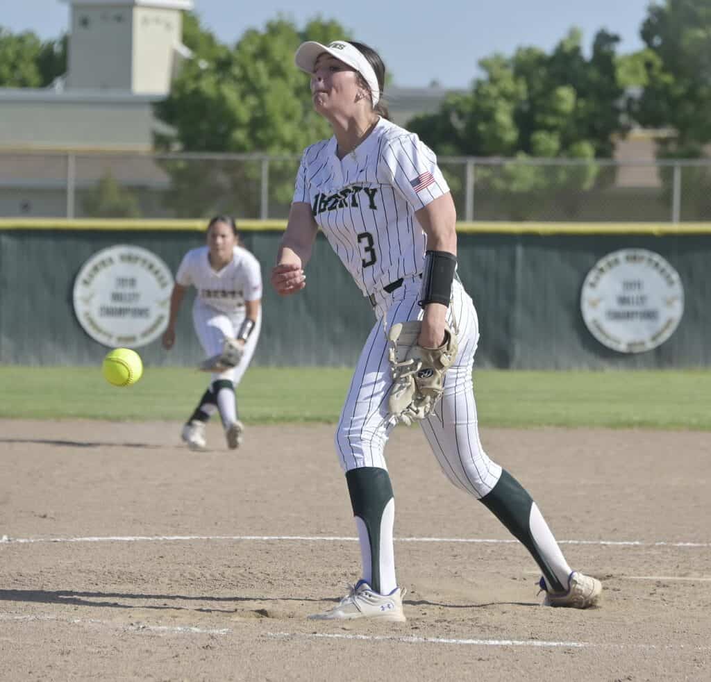 Photo - Liberty’s Karsyn Bauer throws a pitch during a four-hit shutout victory over the Fowler Redcats. Bauer struck out 12 and also had three hits at the plate in a 6-0 victory.