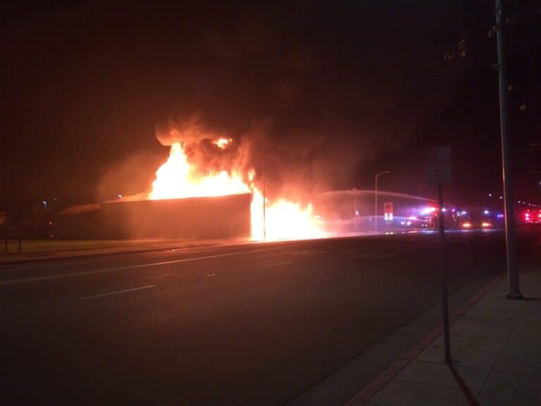 Blaze destroys buildings