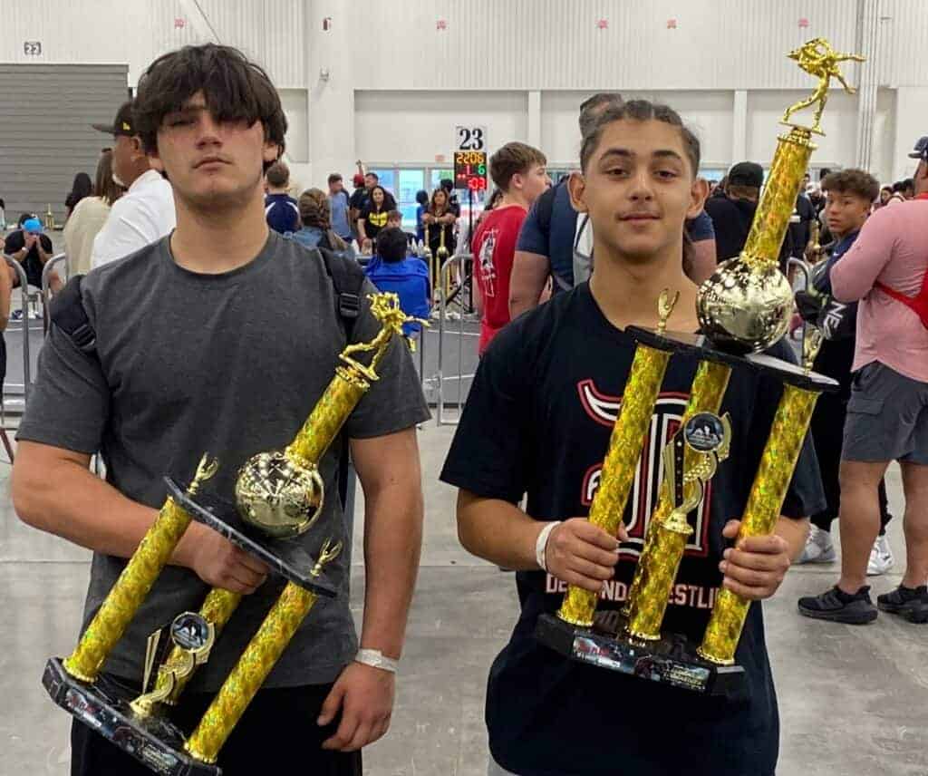 Photo - Madera Grapplers wrestlers Paul Costa, left, and Jaxon Denney hold their trophies they received at the Rocky Mountain Nationals in Las Vegas.