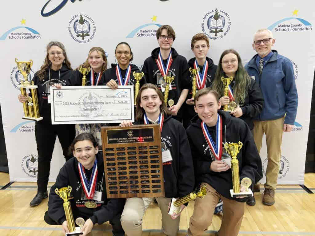 Photo - The Glacier Point Academic Decathlon team shows off awards after winning its fourth straight Madera county Academic Decathlon title.