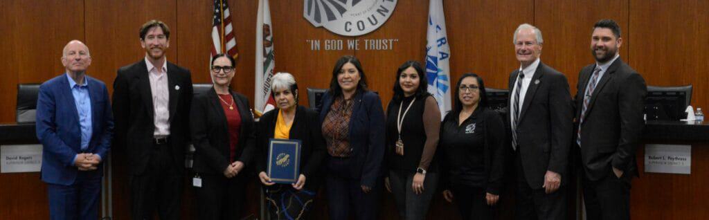 Photo - Deputy Director of Madera County Social Services (third from left). Nickie Matus, is joined by several of her colleagues and the Madera County Supervisors, who presented a proclamation to the department in recognition of National Social Worker Month.