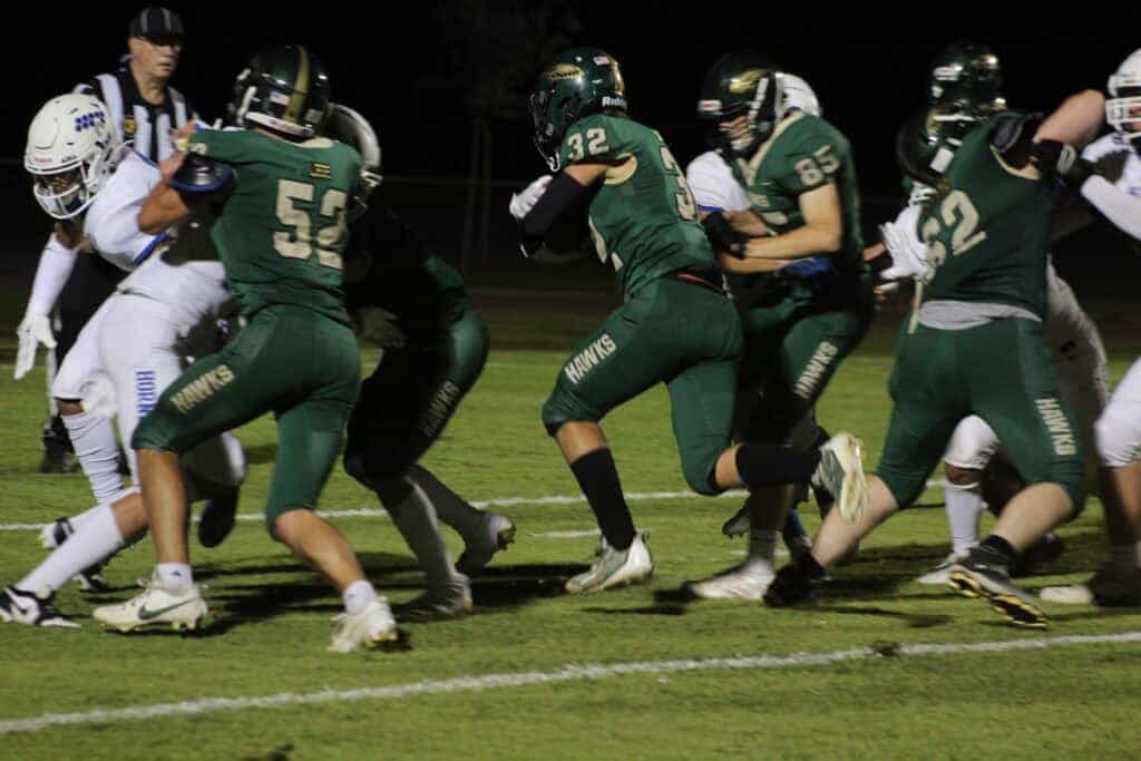 Photo - Liberty’s Sebastian Graham (32) scores his first touchdown of the season in Friday’s 34-7 victory over Sanger West.