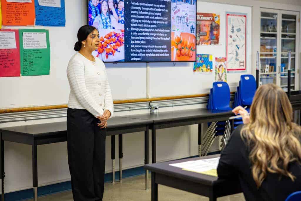 Photo - Madera High School Senior Gurleen Dhaliwal presented her Graduate Profile Senior Showcase to a panel of teachers, district staff, and community members on March 24. The district-wide initiative is a framework designed to ensure that every student graduates with the essential skills and competencies needed to thrive in college, career, and life. 