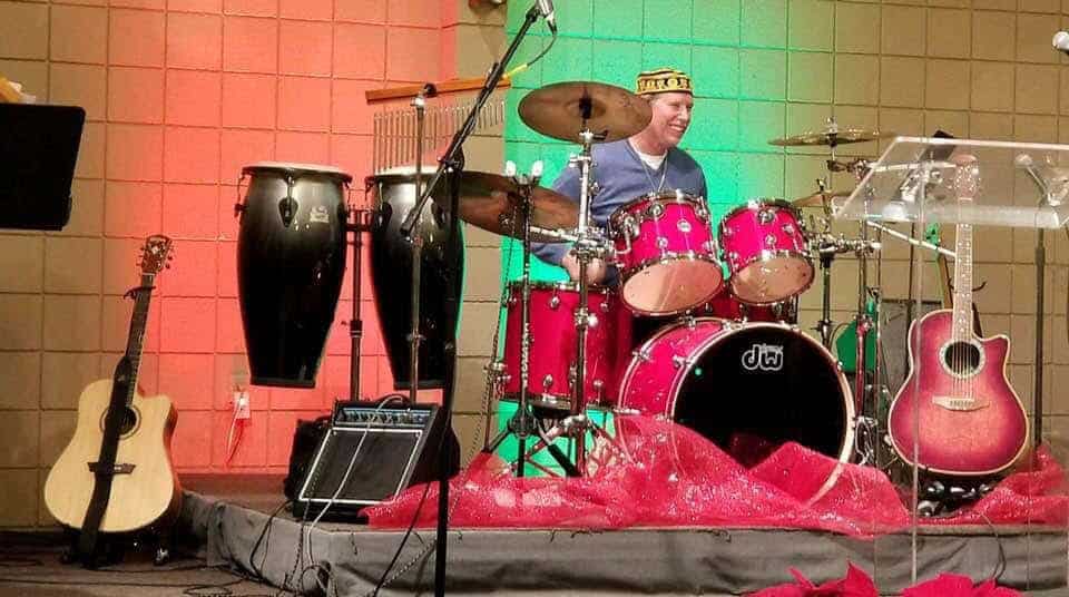 Photo - Dave Dougherty practices for the upcoming “Old Neon Star” performance at Harvest Community Church. The event will begin 5 p.m. and is open to the public.