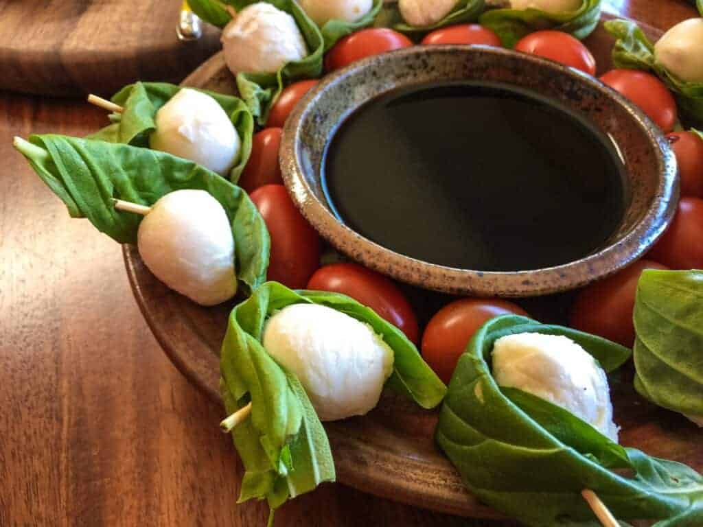 Photo - Skewers are great for picnics. Try mozzarella, basil and tomatoes, or go all out and add artichoke hearts, olives, marinated bell peppers, cured meats or tortellini.