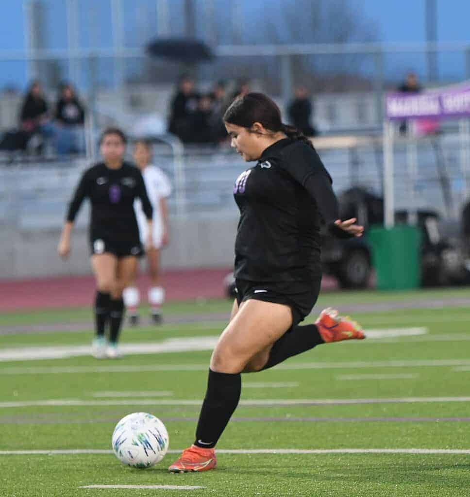 Photo - Madera South’s Jayleen Rodriguez sends a shot on goal during Friday’s 4-0 victory over the McLane Highlanders. Rodriguez scored two of the four goals in the win. 