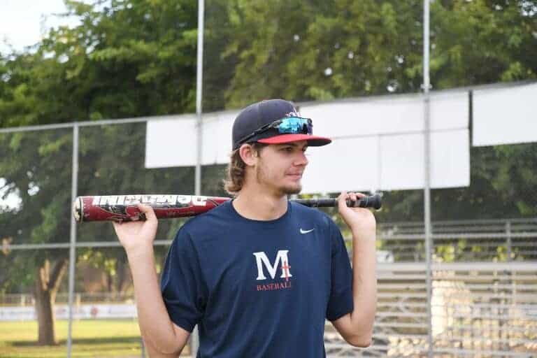 Former player returns to help champs