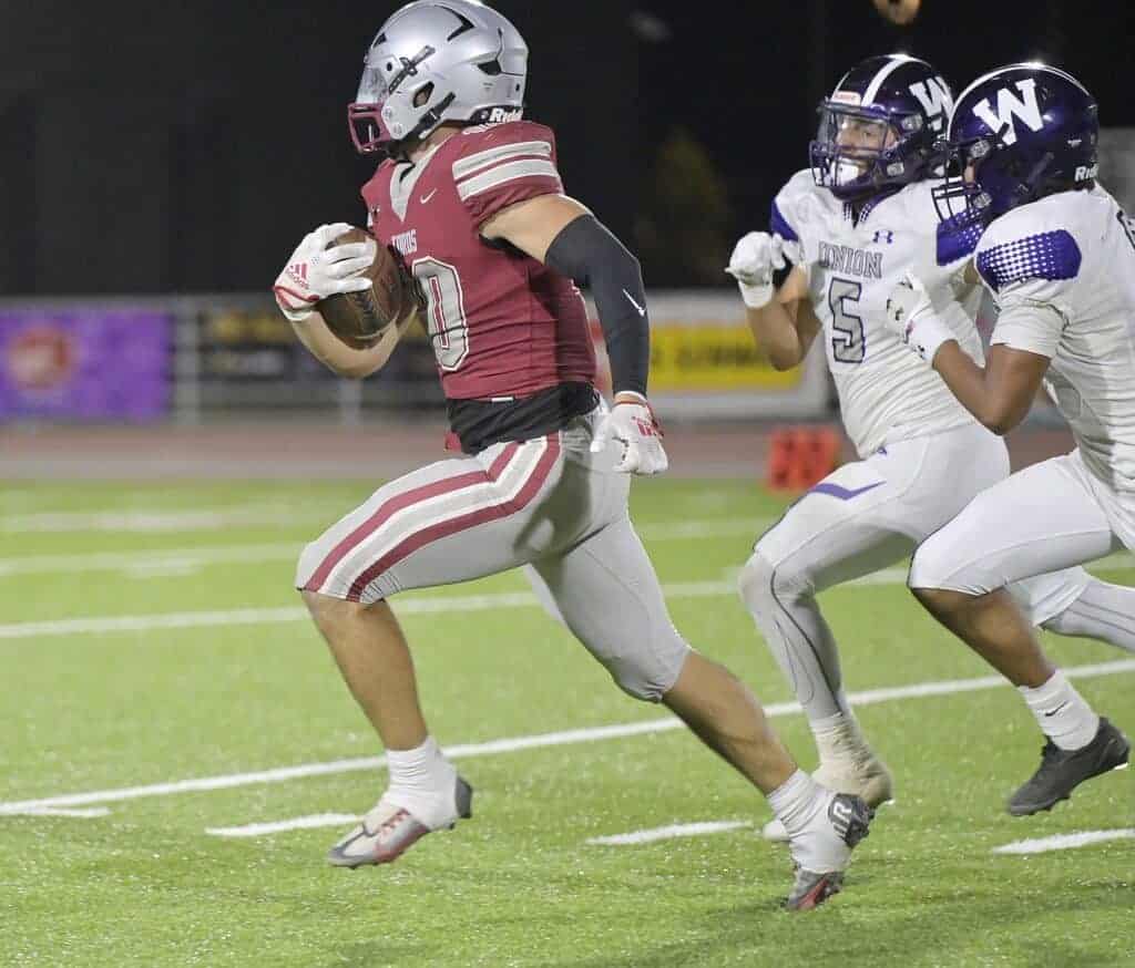 Photo - Torres’ Amani Sua outruns the Washington Union defense during a 66-yard touchdown run in Friday’s loss. Sua rushed for three touchdowns and 175 yards in the loss.