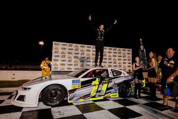 Photo - Jacob Smith celebrates his first win of the season at Madera Speedway after an Pro Late Model win Saturday.