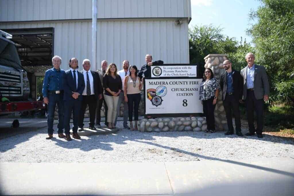 Photo - Members of the Picayune Rancheria of the Chukchansi Indians and Madera County officials gather at Madera County Fire Station 8 following the signing of a Memorandum of Understanding on Friday.