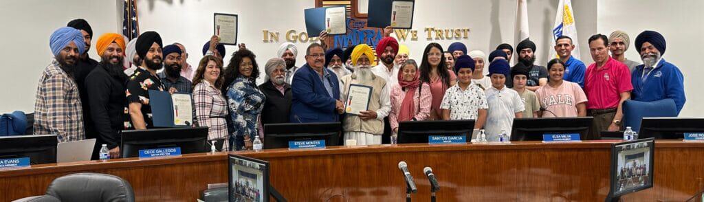Photo - The Madera Sikh Community is joined by all council members and the Mayor of Madera in the City Council chambers.